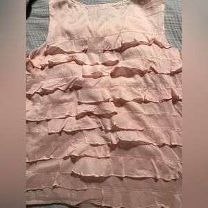 Pink cotton ruffled tank top.